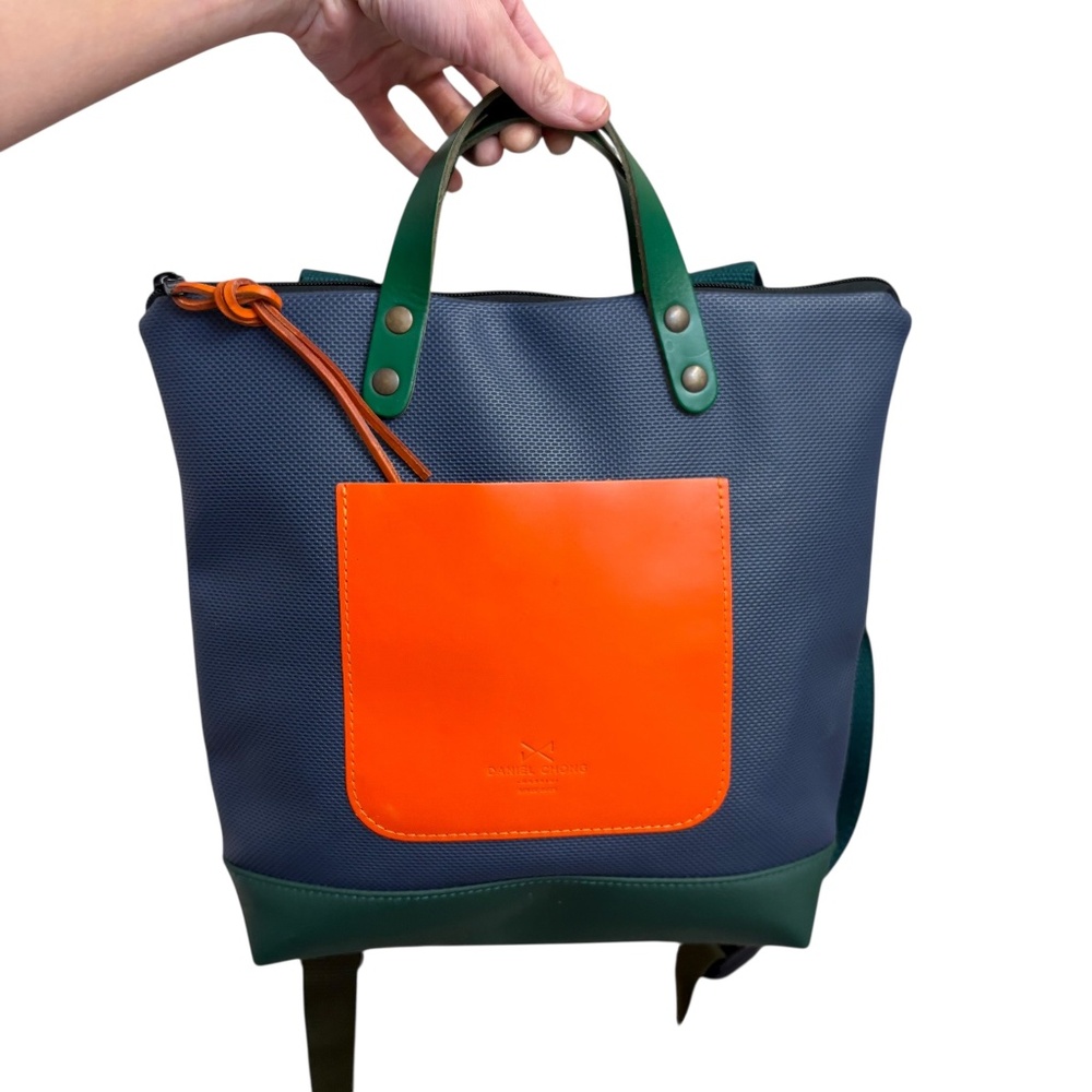 Daniel Chong blue green orange backpack